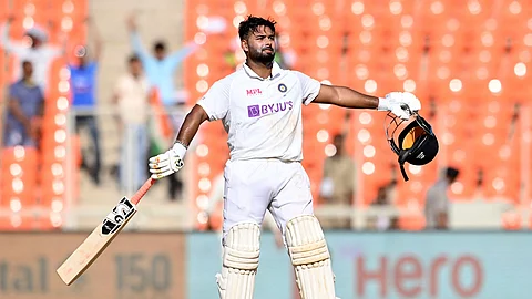 Rishabh Pant celebrates after scoring a century on the second day of the fourth Test cricket match between India and England