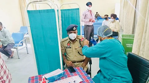 Police officer in Ludhiana receiving the jab of COVID-19 vaccine (File pic)