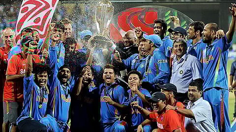 Indian cricket team lifting the World Cup trophy after defeating Sri Lanka in 2011