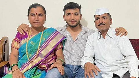 Aniket Shinde with his proud parents