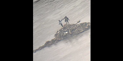 Fire Brigade Saves Two Stranded in Mutha River Amid Rising Water Levels