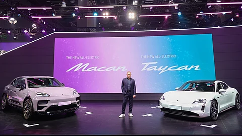 Manolito Vujicic, Brand Director, Porsche India with the all-new Macan BEV and Taycan