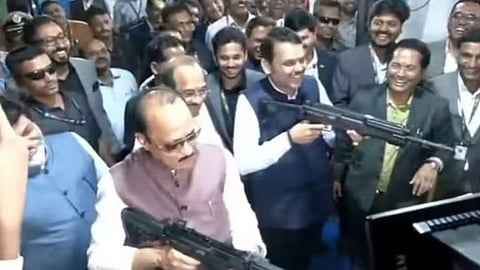 Ajit Pawar and Devendra Fadnavis with AK47 in their hands