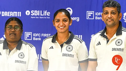 Chief Selector Neetu David, Captain Harmanpreet Kaur, and Coach Amol Mazumdar