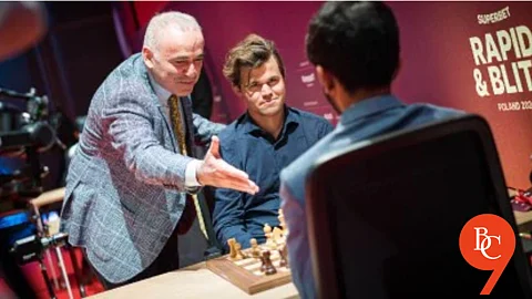 Garry Kasparov alongside Magnus Carlsen courting D Gukesh