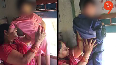 Viral Clip Sparks Debate: Child Seen Urinating from Moving Train, Assisted by Mother