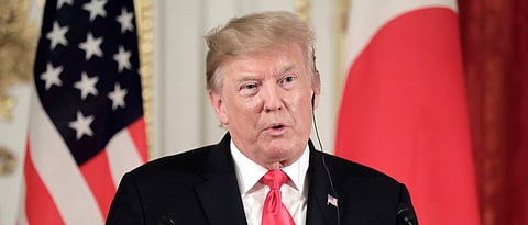 Trump breaks with Abe, says not bothered by NK missile tests