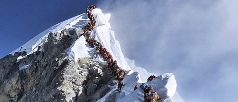 Deaths rise as Nepal issues more permits for Mount Everest