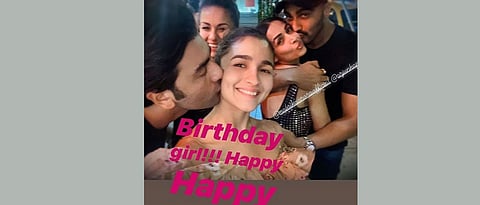 Ranbir Kapoor giving a peck on Alia's cheek, picture goes viral