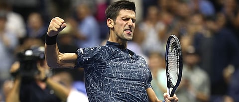 Djokovic beats heat and Millman to reach U.S. Open semis