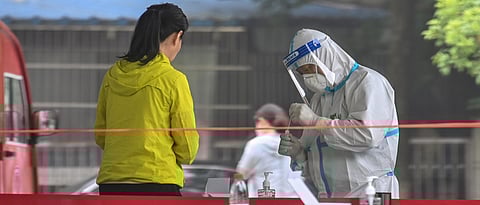 Coronavirus China: Cases fall below 100 for first time since January