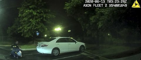 Atlanta police officer shoots a black man while trying to arrest him