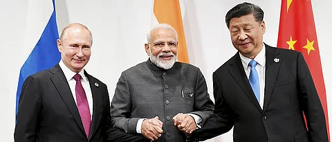PM Modi discusses counter-terror, climate change with Putin, Xi