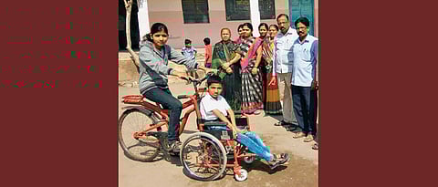 Girl invents cycle for disabled brother