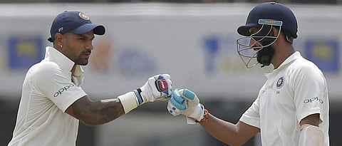 Shikhar Dhawan stands tall