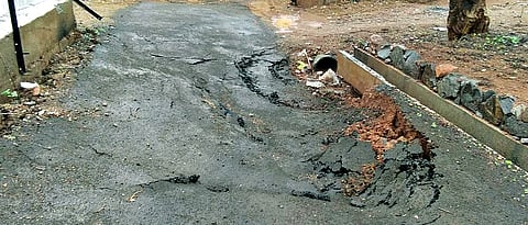 Villagers worried after portion of road caves in at Malin