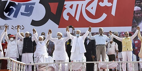 Left Front, Congress and ISF leaders join hands during a joint rally ahead of West Bengal assembly polls in Kolkata, February 28, 2021.
Image Courtesy: PTI