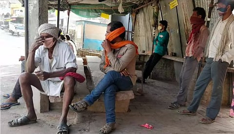 Daily wage workers at the mazdoor naka in Gogunda waiting for contractors to hire them.