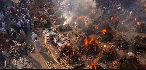 Photo: Crematoriums in India overwhelmed. Source: USA Today,