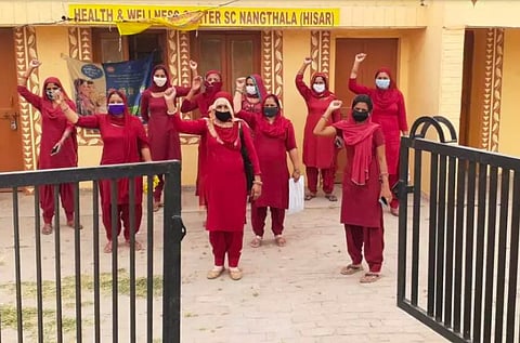 ASHAs held demonstrations at local sub-centres and primary health centres across the country on Monday. Image from Hisar, Haryana. | Image Courtesy - Special Arrangement