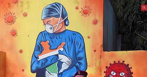 A mural depicting a health worker caring for the country during the COVID-19 crisis.
(Anindya Chattopadhyay/TOI)