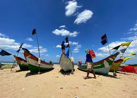 Fishermen Hoisting Black Flags in Boats (Image Courtesy: DT Next)