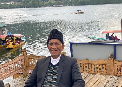 Sampat Prakash a few months before his death, with the Dal lake watching in the background