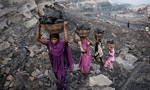 कोयला खदानों में काम करने वाले मजदूर.