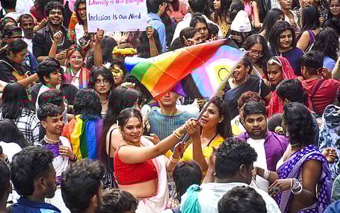 A member of the LGBTQ+ community poses for photos during the Pride March rally from Kanteerava Stadium to Ravindra Kalakshetra in Bengaluru on Sunday, November 24, 2024.