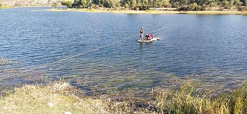 Tribal farmer Varda Gameti ferry people between their homes and fields on his bamboo raft