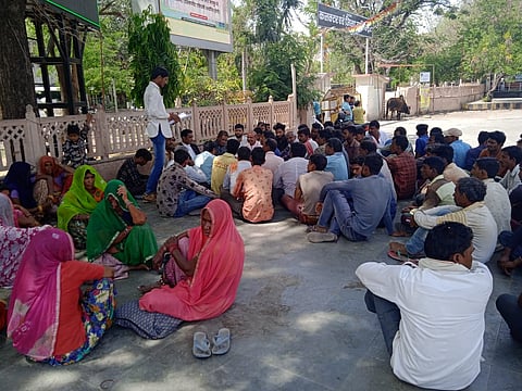 People sitting on dharna