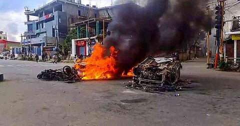 Vehicles in flames after violence broke out in Manipur's Imphal on Thursday.
