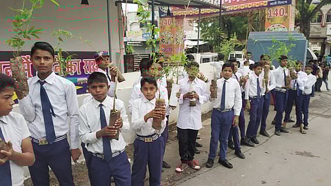 Students on a plantation drive at EMRS in Dungarpur