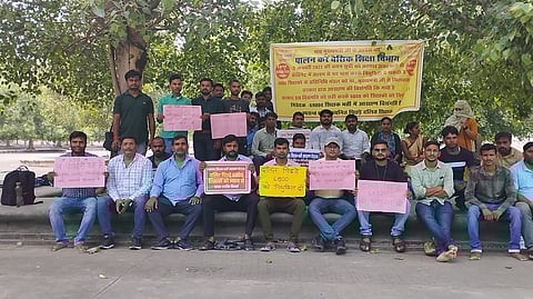The protesting candidates at Kanshiram Eco Garden.