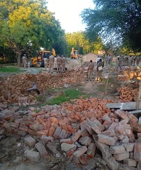 Approximately 23 illicitly constructed and partially built houses faced demolition, while others were sternly warned to swiftly evacuate their premises.