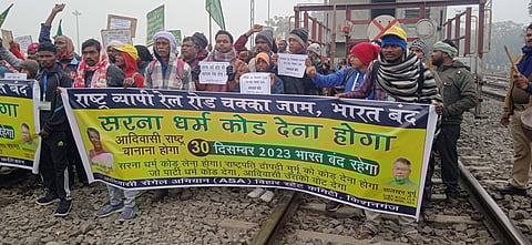 Adivasi Sengal Abhiyan supporters staging Rail Roko protests over the Sarna Dharma Code demand.