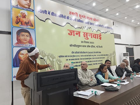 A sanitation worker under Delhi Jal Board revealing his plight in front of the jury