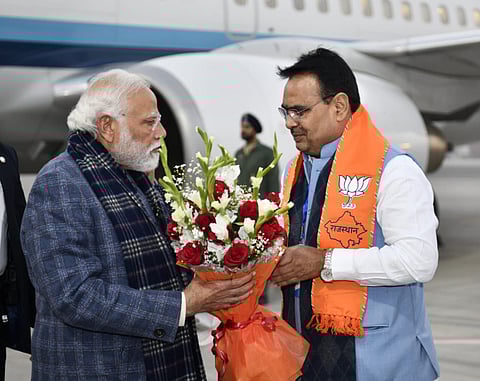 PM Modi being greeted by Chief Minister Bhajanlal Sharma at his arrival on Friday evening at Jaipur