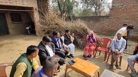Local residents discussing affairs with the bride's family