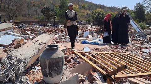 Legacy in Rubble- Debris Scatters as Bulldozers Level 386 Homes in Century-Old Slum