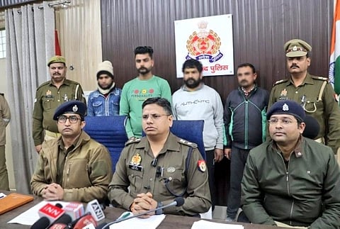 The arrested men in police custody.