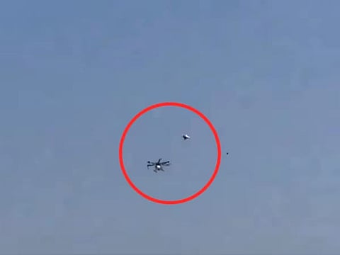 The farmers flew kites and tried bring the drones down.