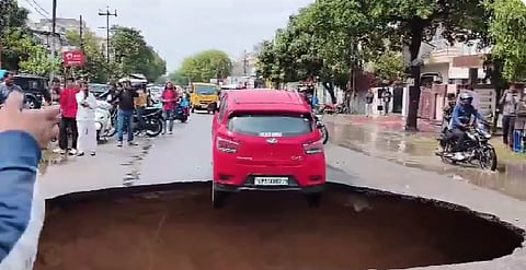Rain Fury in UP : Massive Sinkhole Emerges in Lucknow, Car Left Hanging, Farmers Grieve Crop Loss
