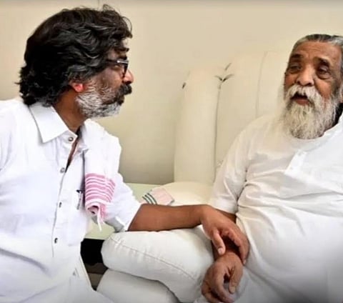 After walking free following five months of incarceration, an emotional Hemant Soren (left) meets his father Shibu Soren.