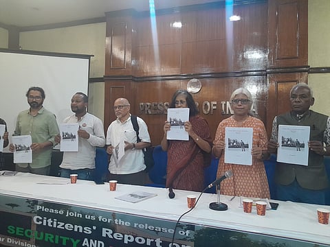 The report urges the government to address the grievances of the Adivasi communities and respect the legal frameworks designed to protect their rights.