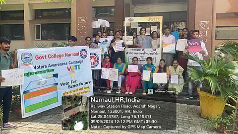 Under Voter Awareness Campaign, students of Government PG College, Narnaul clicked photos at the selfie point after participating in poster making and slogan writing.