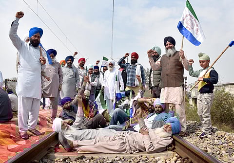 Farmers blocked tracks during their 'rail roko' protest at Devi Das Pura in March. (File Pic)