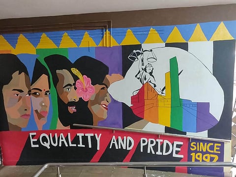 A beautiful wall art at NLSIU Bangalore, created by a collective of transgender and cis-women artists, stands as both a beautiful aspiration and a poignant reminder of the distance yet to be traveled in achieving true equality.