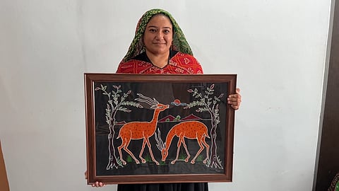 Dharmilaben began learning the intricate Ahir embroidery at just five years old from her grandmother and maternal grandmother.