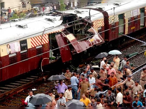 Seven coordinated explosions ripped through first-class compartments of packed local trains in just 11 minutes during evening rush hour, using pressure cookers filled with a deadly mix of RDX and ammonium nitrate.